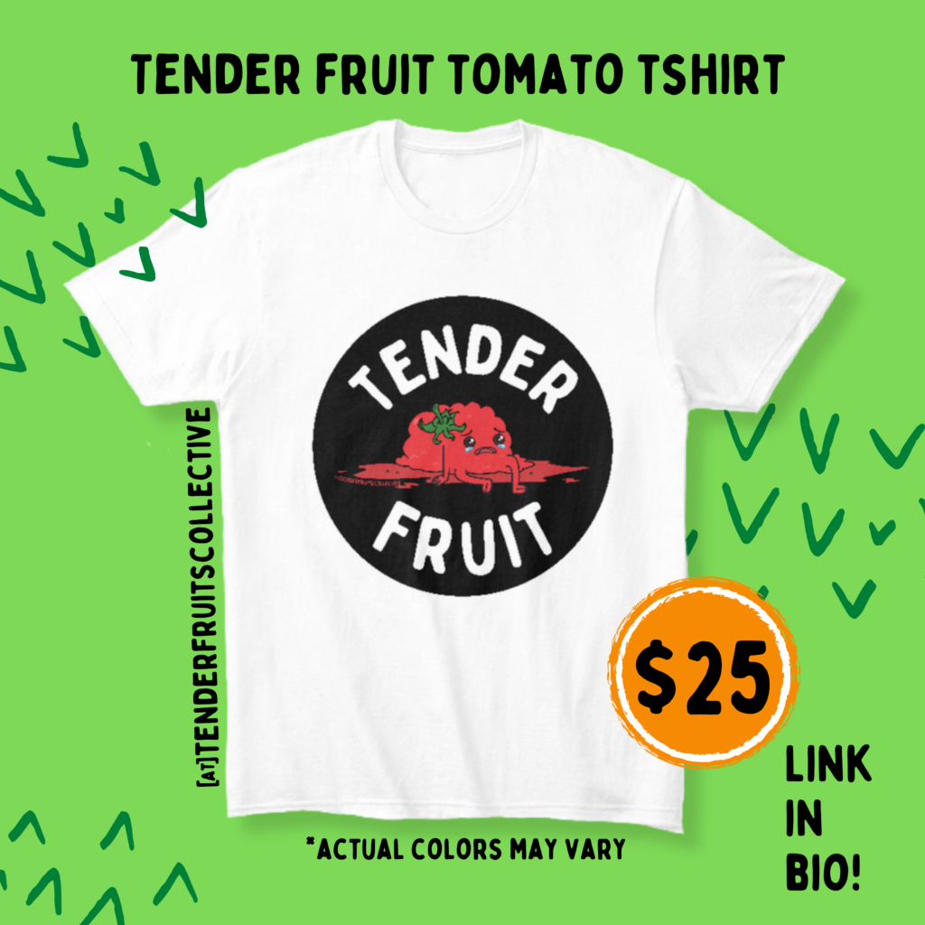 A white, Comfort, unisex, t-shirt with a Tomato Tender Fruit design. The design is an illustration of a crying, mushy, tomato with white, all caps text that reads "Tender Fruit" above and below them. The tomato and text is encased in a black, circle. The t-shirt is in front of a green background with dark green V pattern sporadically around. “tender Fruits Tomato Tshirt” “Actual colors may vary” and “link in bio!” is in black all caps text above and below the shirt. a small orange circle sits at the bottom right of the shirt. with a $25 tag in front of it.