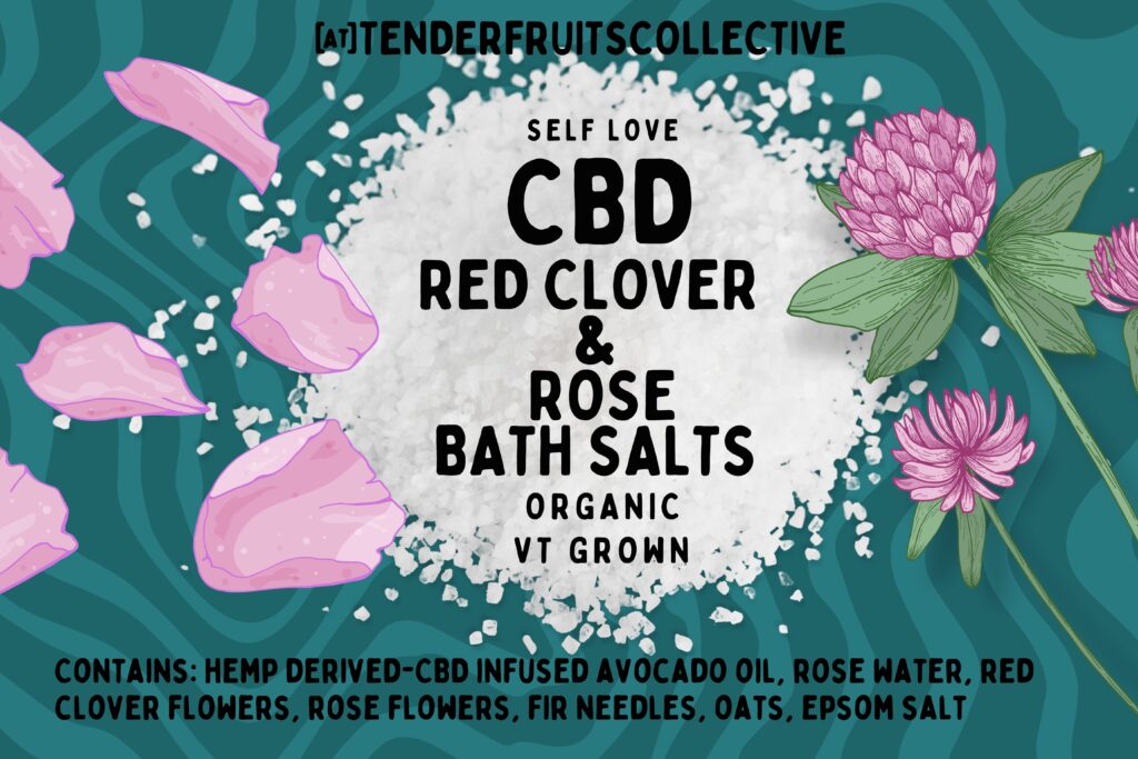 the label for the bath salt. An illustration rose petals on the left and red clover flowers on the right framing a pile of salt. The background is a wavy, light and dark blue alternating pattern background. Black text in front of the shape and background read "self love/C.B.D. red clover and rose bath salt/ organic/ VT grown" and the ingredients listed above.